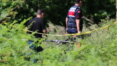 Oğlunun kullandığı çim biçme makinesi sonu oldu