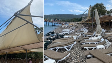 Kemer'de kuvvetli fırtına şezlong ve şemsiyeleri uçurdu